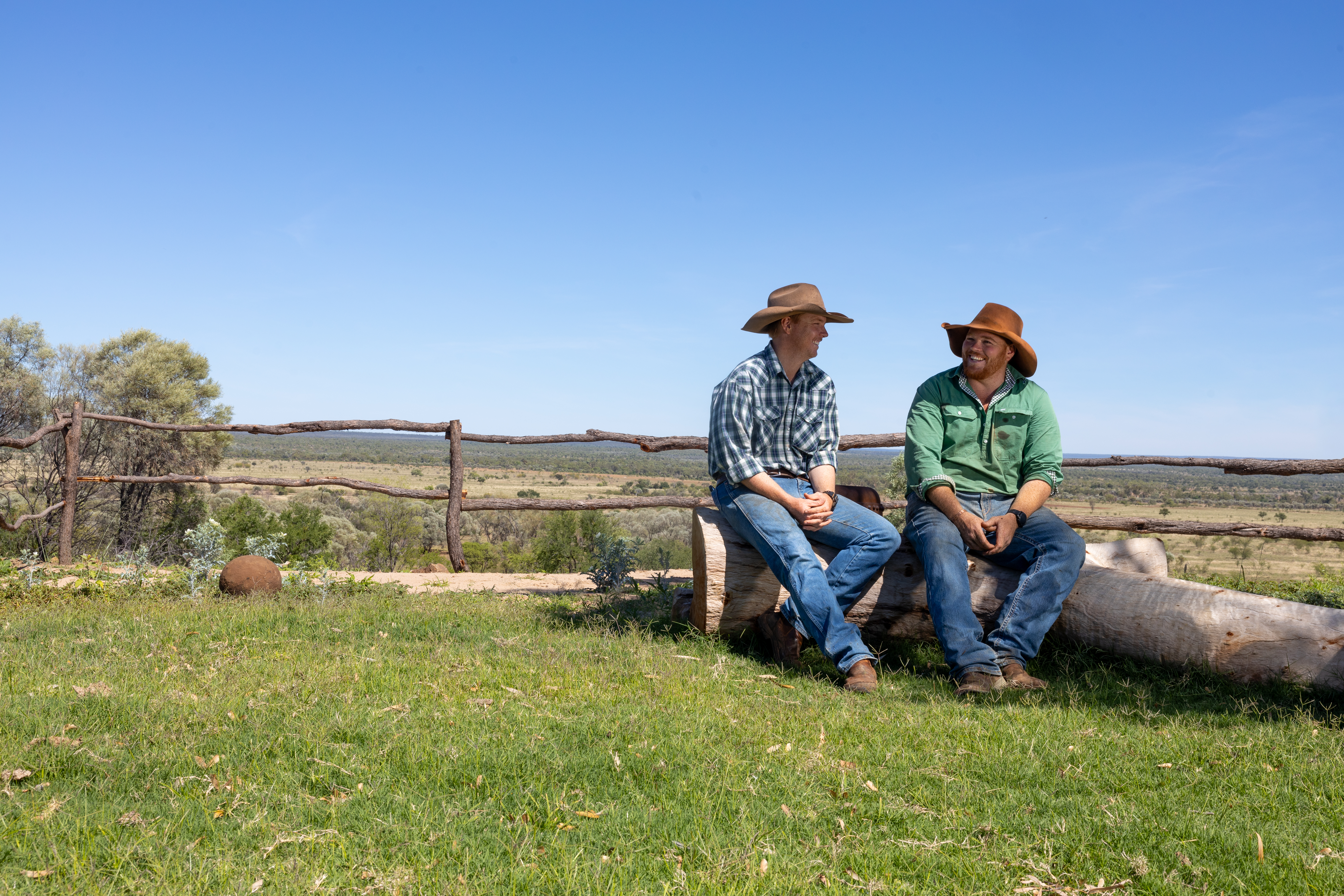 Luke and Jake Anning sitting on a bench at Wongalee Station
